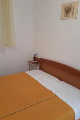 Krevet ili kreveti u jedinici u objektu Apartments by the sea Sveta Nedilja, Hvar - 11433