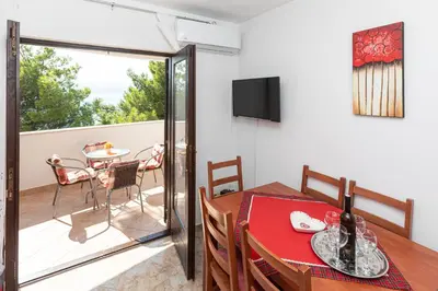 TV i/ili zabavni centar u objektu Apartments Cvita