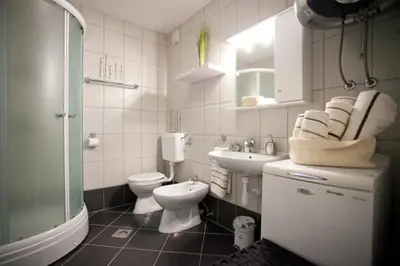 Kupaonica u objektu Apartments Mediterranea with heated pool