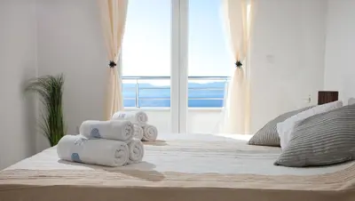 Krevet ili kreveti u jedinici u objektu Apartments Mediterranea with heated pool