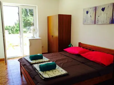 Krevet ili kreveti u jedinici u objektu Guest house Perfect Location