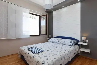 Krevet ili kreveti u jedinici u objektu Apartments Romantica
