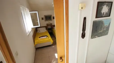 Krevet ili kreveti u jedinici u objektu Seaside Apartment