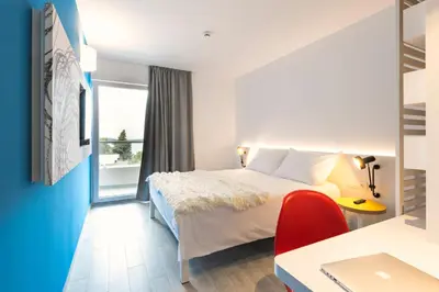 Krevet ili kreveti u jedinici u objektu Pharos Hvar Bayhill Hotel