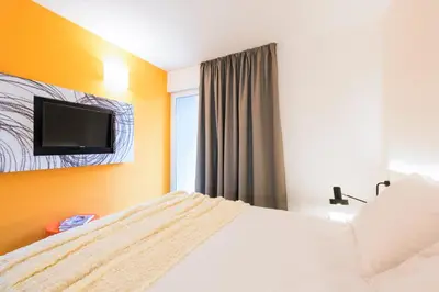 Krevet ili kreveti u jedinici u objektu Pharos Hvar Bayhill Hotel