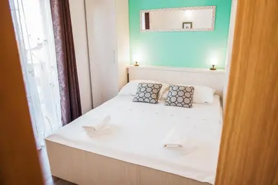 Krevet ili kreveti u jedinici u objektu Apartmani Petričević