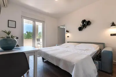 Krevet ili kreveti u jedinici u objektu Maslina Apartments