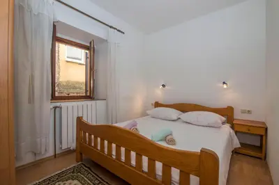 Krevet ili kreveti u jedinici u objektu Apartments Jaksa