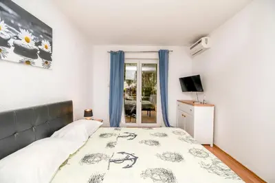 Krevet ili kreveti u jedinici u objektu Apartments and Room Napoli