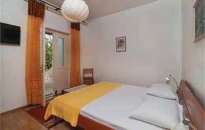 Krevet ili kreveti u jedinici u objektu Two-Bedroom Apartment In Supetar