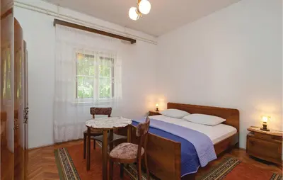 Krevet ili kreveti u jedinici u objektu Two-Bedroom Apartment In Supetar