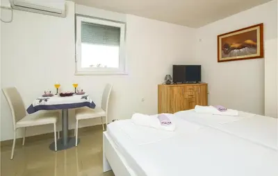 TV i/ili zabavni centar u objektu Studio Apartment In Mali Rat