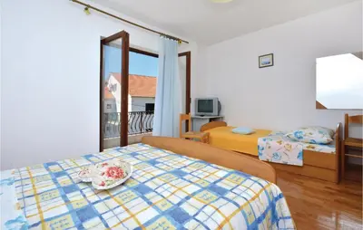 Krevet ili kreveti u jedinici u objektu One-Bedroom Apartment In Vrboska