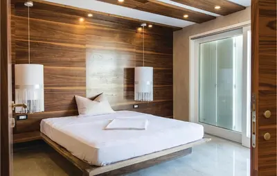 Krevet ili kreveti u jedinici u objektu Eight-Bedroom Holiday Home In Podstrana