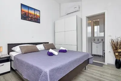 Krevet ili kreveti u jedinici u objektu Family apartments Leona Makarska