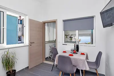 TV i/ili zabavni centar u objektu Family apartments Leona Makarska