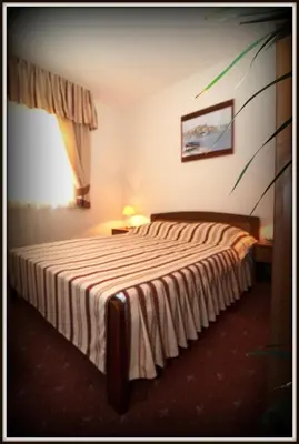 Krevet ili kreveti u jedinici u objektu Hotel Rosina