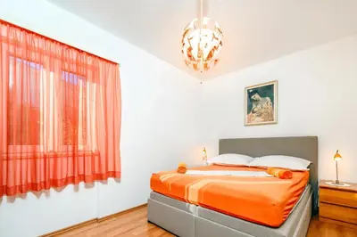 Krevet ili kreveti u jedinici u objektu Apartments by the sea Pisak, Omis - 6897