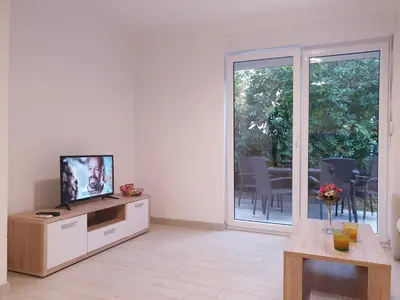 TV i/ili zabavni centar u objektu Apartments Ellie