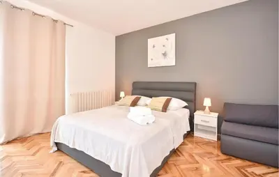 Krevet ili kreveti u jedinici u objektu Two-Bedroom Apartment In Podstrana