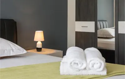 Krevet ili kreveti u jedinici u objektu Two-Bedroom Apartment In Podstrana