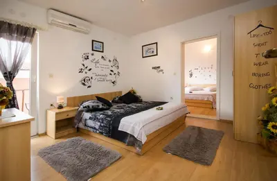 Krevet ili kreveti u jedinici u objektu Apartment & Rooms Marigold
