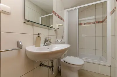Kupaonica u objektu Apartments and Rooms LEA
