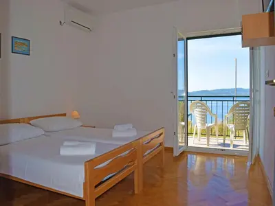 Krevet ili kreveti u jedinici u objektu Apartments Buljan