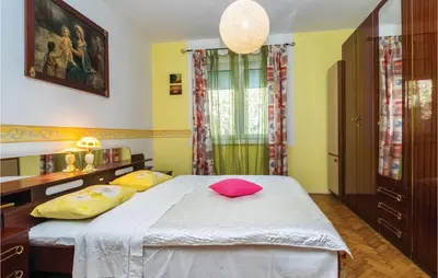 Krevet ili kreveti u jedinici u objektu Two-Bedroom Apartment In Jesenice