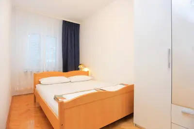 Krevet ili kreveti u jedinici u objektu Apartments with parking space Podstrana, Split - 10249
