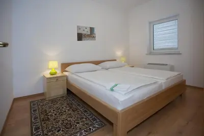 Krevet ili kreveti u jedinici u objektu Apartments with a swimming pool Zavode, Omis - 11786