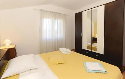 Krevet ili kreveti u jedinici u objektu Three-Bedroom Apartment In Gata