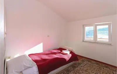 Krevet ili kreveti u jedinici u objektu Three-Bedroom Apartment In Gata