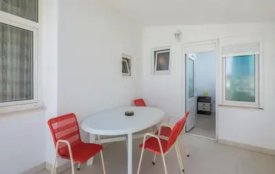 TV i/ili zabavni centar u objektu Apartments and Rooms Denis