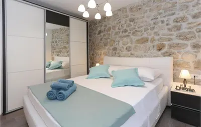Krevet ili kreveti u jedinici u objektu Three-Bedroom Holiday Home In Gata