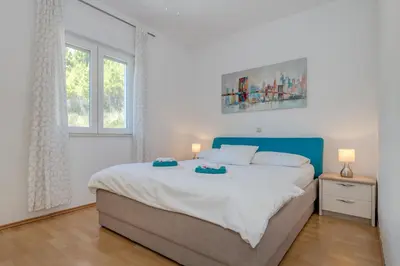 Krevet ili kreveti u jedinici u objektu Apartments Cala