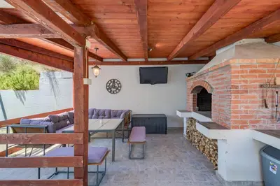 TV i/ili zabavni centar u objektu Apartments Cala