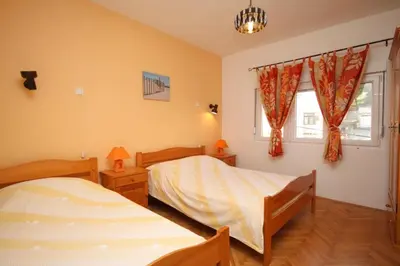Krevet ili kreveti u jedinici u objektu Apartments by the sea Duce, Omis - 8633