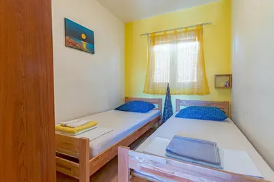 Krevet ili kreveti u jedinici u objektu Apartments by the sea Basina, Hvar - 11923