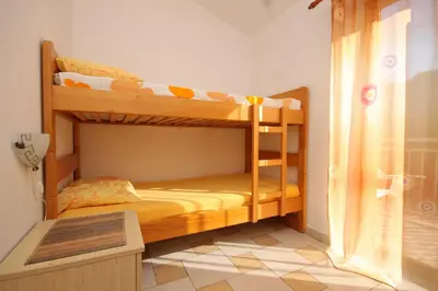 Krevet ili kreveti u jedinici u objektu Apartments by the sea Milna, Hvar - 8795