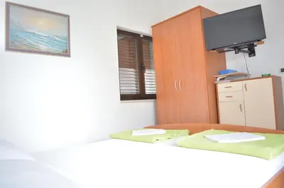 Krevet ili kreveti u jedinici u objektu Apartments Marinko
