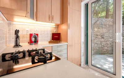 Kuhinja ili čajna kuhinja u objektu Pine Beach Villa