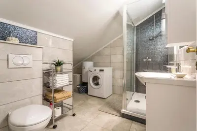 Kupaonica u objektu House Luce with pool