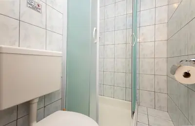Kupaonica u objektu Apartments Zecic