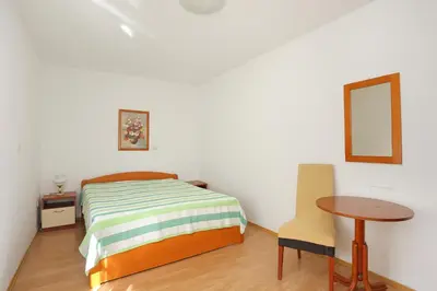Krevet ili kreveti u jedinici u objektu Apartments by the sea Brela, Makarska - 6688