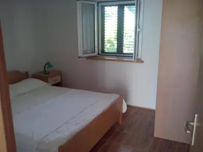 Krevet ili kreveti u jedinici u objektu Apartments by the sea Sumartin, Brac - 11658