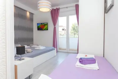 Krevet ili kreveti u jedinici u objektu Apartmani Marina
