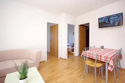 TV i/ili zabavni centar u objektu Apartments Solis