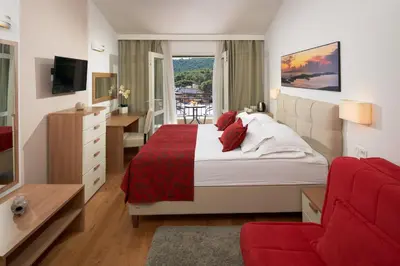 Krevet ili kreveti u jedinici u objektu Hotel Fortuna