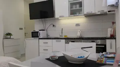 Kuhinja ili čajna kuhinja u objektu Apartments Luce - Dome
